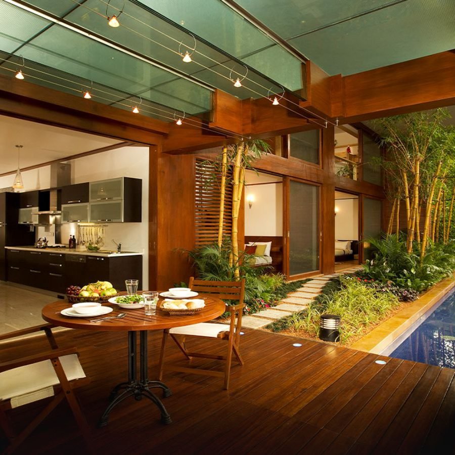 Total Environment - Windmills of Your Mind - Duplex - living space opening into deck & garden