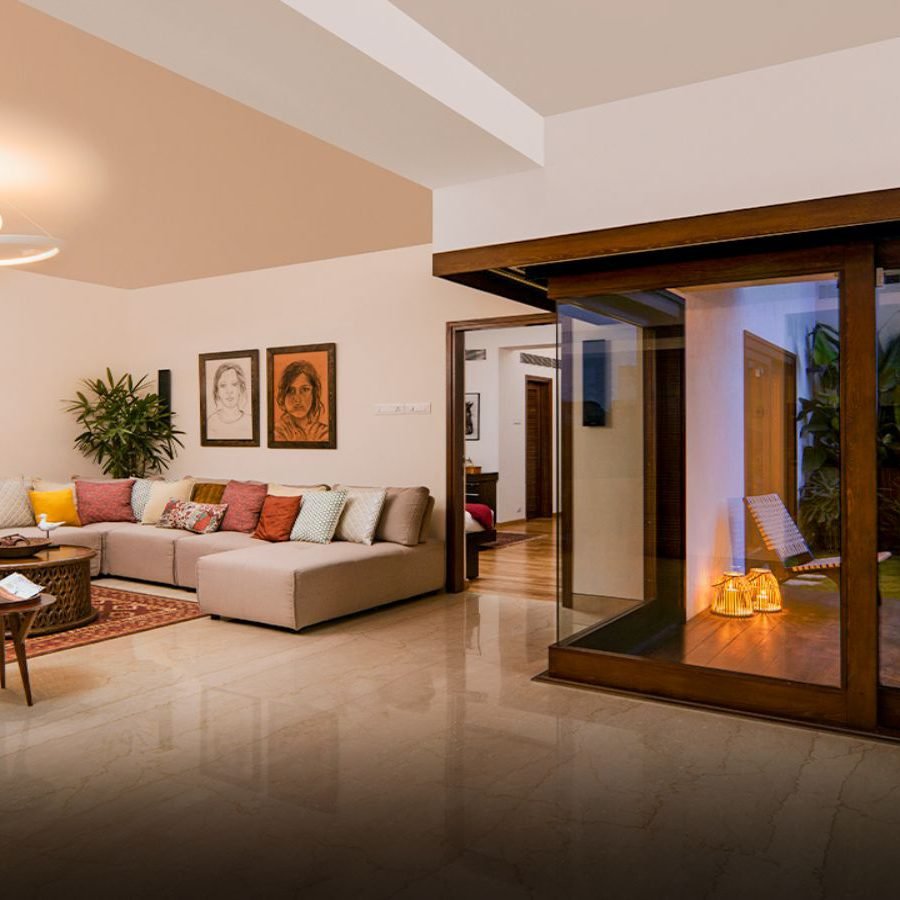 Total Environment - Learning to Fly - Living room opening into wooden deck