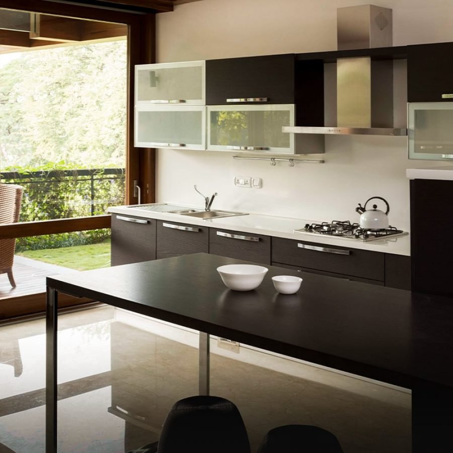 Songs from the Woods - Fitted kitchen leading to wooden deck